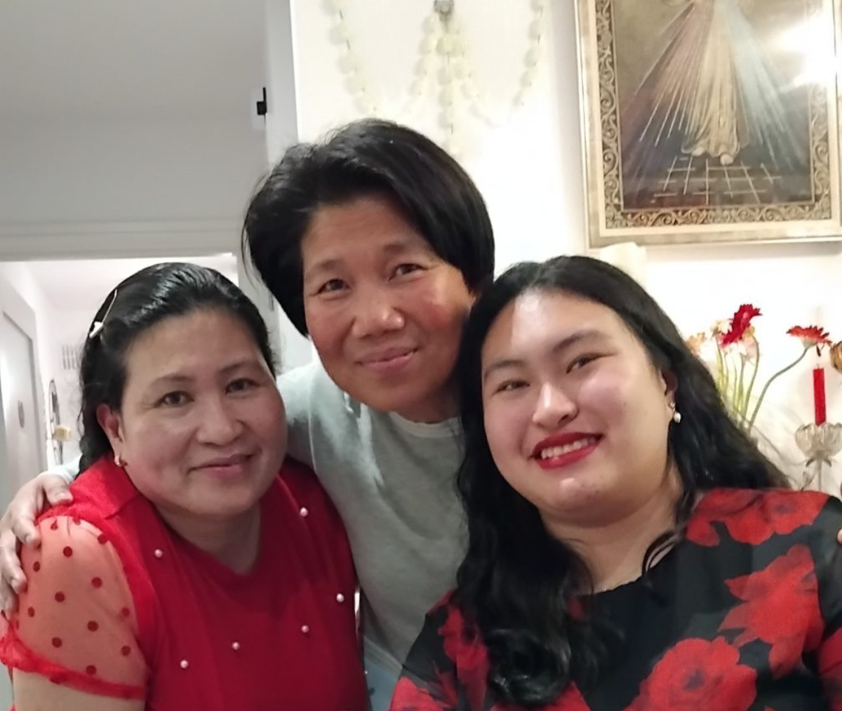 Angie (centre) with Arfe Conception, a Filipino nurse in Navan, Ireland and her daughter Angel