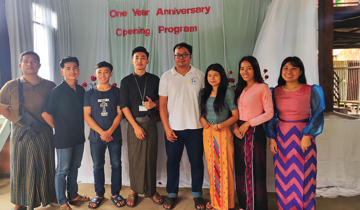 Fr Kurt Zion Pala (center) with Student Learning Resources Centre staff. - Photo: Fr Kurt Zion Pala SSC