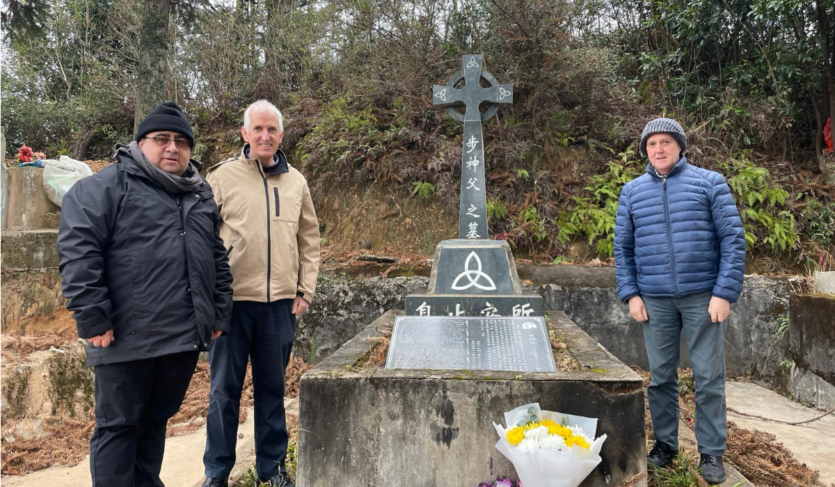 Fr Tim Mulroy, Fr Alvaro Martinez and Fr Dan Troy visiting the grave. 