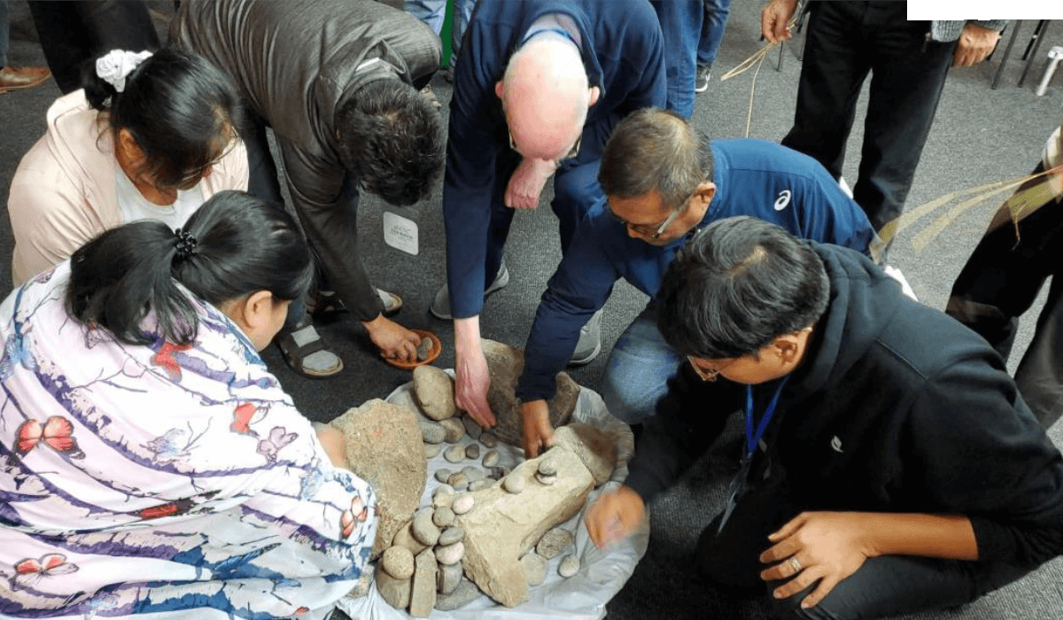 GA participants engaged in a collaborative effort in creating a fireplace
